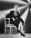 A dramatic fashion portrait of Adele Jergens dating from the late ’40’s. No film designation is listed, but it is most likely Director S. Sylvan Simon’s film noir mystery drama, "I Love Trouble" or Director Howard Bretherton's action thriller, "The Prince of Thieves", both from 1948. Ned Scott used structured backgrounds, called "rear projection" to enhance the drama of the image.
