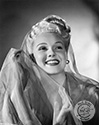 An in-costume portrait of Adele Jergens to support her role as Princess Armina in Columbia Studios "A Thousand and One Nights", 1945. Princess Armina, the daughter of the reigning Sultan Kamar-Al-Kir, later becomes the object of Alladin's desire. His plans are foiled, even with the help of Genie Babs, played by Evelyn Keyes, when the Sultan's evil twin brother gets involved. Director Alfed E. Green's adventure fantasy, "A Thousand and One Nights", 1945.