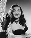 Ann Miller, posed as Linda Lorens, a star performer in a Rio revue, in The Thrill of Brazil, 1946.