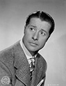 A portrait of Don Ameche to upport his role as a failed film director, Don Gayle, in the 1948 Columbia Studios film "Slightly French". Gayle tries to regain his prominence in the film industry by hooking up with an attractive and clever Irish girl he meets at a local carnival, Mary O'Leary, played by Dorothy Lamour. Things become hopelessly tangled as the pair pass O'Leary off as a French heiress. Nonetheless Gayle is hired again before the charade breaks down. Director Dougles Sirk's romantic musical comedy, "Slightly French", 1948