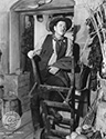George Bancroft appears in an offset photograph as the tough minded sheriff "Curly" in Director John Ford's epic Western drama, Stagecoach, 1939. 