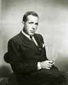 An intriguing portrait of Humphrey Bogart as Captain Warren "Rip" Murdock in the film noir thriller "Dead Reckoning". A close friend and associate of Murdock's goes missing and winds up dead later. Murdock tries to find out all he can about his friend and he learns that he had been accused of murder. Things get more complicated when Murdock locates the girlfriend of the man his friend was accused of killing. They develop a relationship on the way to solving this crime. Director John Cromwell's film noir mystery, "Dead Reckoning", 1947.
