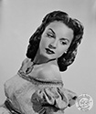 A portrait in costume of Janet Blair to support her role as Joanna Sedley in Director Gordon Douglas’ romantic historical adventure, "The Black Arrow", 1948.