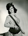 An off-set portrait of Joan Bennett to support her role as Kay Karrigan, accused murderer from San Francisco in Tay Garnett's comedic drama 'Trade Winds', 1938. Karrigan is pursued by Detective Sam Wye, played by Fredric March, and that pursuit involves shipboard romance, helter skelter travels and comedic interludes supplied by Ann Southern's character, Jean Livingstone.