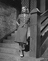 June Vincent poses for an off-set photograph to support her role as Carol Crump, daughter of Horace Crump, played by David Bruce. . It was this film which helped bring notoriety to Ozzie Nelson, later of the Ozzie and Harriet TV show which began in 1952. Ozzie plays a band leader in this film. Director Edward C. Lilley’s musical comedy, "Honeymoon Lodge", 1943