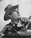 Portrait of Randolph Scott as Brazos Kane, a gunfighter wrongfully accused of murdering a friend, who sets out to prove his innocence in Columbia pictures Western drama, Gunfighters 1947