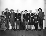 Stagecaost movie cast members in costume with Claire Trevor, John Wayne, Andy Devine, John Carradine, Louise Platt, Thomas Mitchell, Berton Churchill, Donald Meek and George Bancroft.