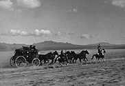 The stagecoach full of terrified passengers attempts to outrun Apache attackers during a raid by Geronimo, the notorious villain in John Ford’s ‘Stagecoach', 1939.