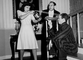 Paulette Goddard pics: An on-set photograph of action at a domestic dust-up with Paulette's character, Molly McKorkle giving Jimmy Stewart's charcater, Jimmy Haskell the business with the soda spritzer. Looking on with surprise is Charlie Arnt who plays Parks, the butler. James Roosevelt's romantic comedy, Pot O' Gold, 1941.