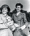 Cadet Nurse Beulah Tyler poses with Nurse Lieutenant Red Murphy on the set of The Story of G.I. Joe. Red Murphy was played by Director William Wellman's wife, Dorothy (Dottie) Coonan.