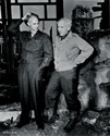 Pausing for a moment's reflection, Ernie Pyle, author of Here Is Your War and Burgess Meredith, star of the upcoming movie Story of G.I. Joe share thoughts while on the movie set. 