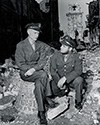 Ernie Pyle interviews Pvt. Kenneth Fowler of the 34th Infantry Division, a combat veteran of the North African and Sicilian campaigns of 1942-43. Ernie Pyle performed many similar interviews while serving as a U.S. War Correspondent during his tour of duty with the U.S. Army. These interviews formed the basis of his many news dispatches sent to outlets back in the United States. And these together with his own stories of his many weeks at the front create the core of his famous book , Here Is Your War, on which the film The Story of G.I. Joe is based.