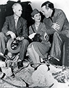 Bob Hope, Ernie Pyle and a lady member of the British Army Reserve Corps share a few thoughts on the set of The Story of G.I. Joe. Bob Hope played himself in his role as a radio voice for the film. 